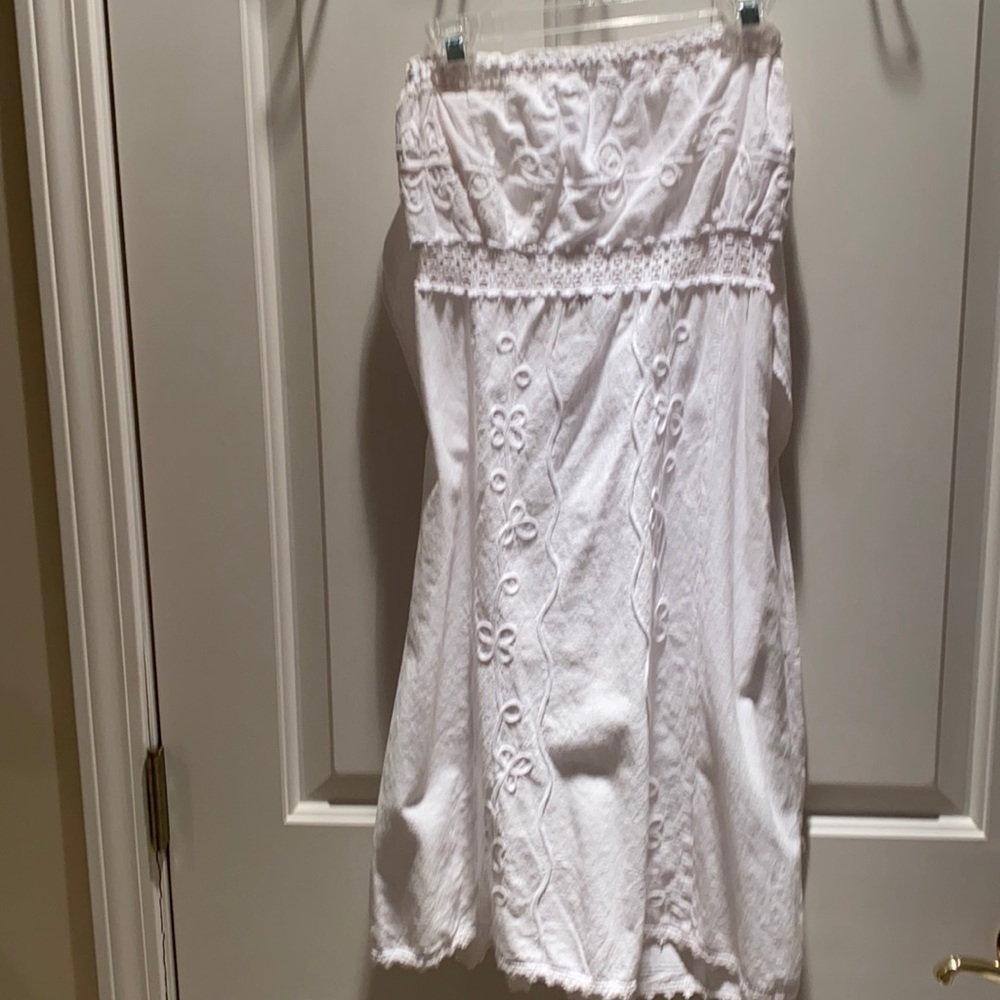 medium strapless white dress, cool tie in the back